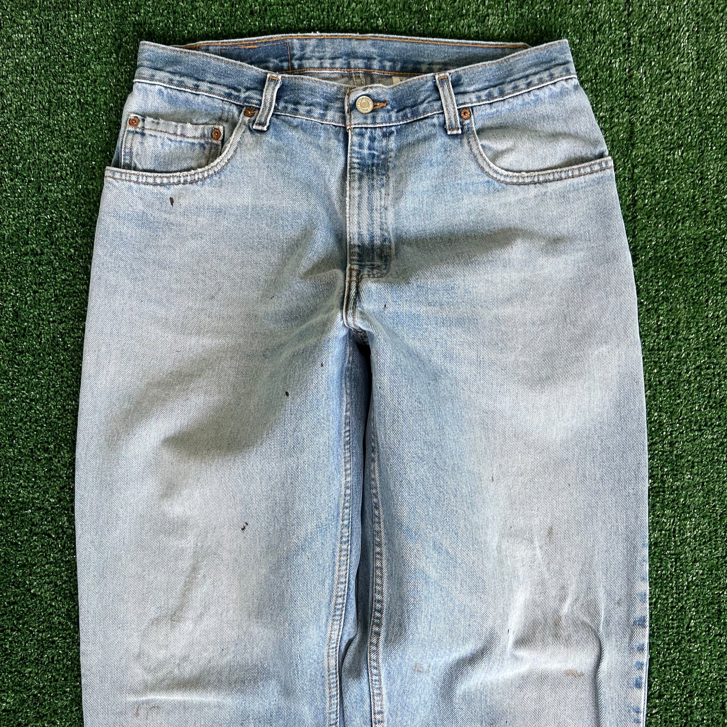 90s Levi's 560 Baggy Tapered Distressed Light Wash Blue Jeans - 34x33.5"