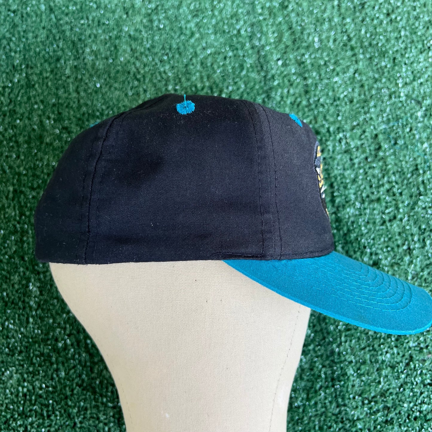 90s Logo 7 NFL Jacksonville Jaguars Black Snapback Hat