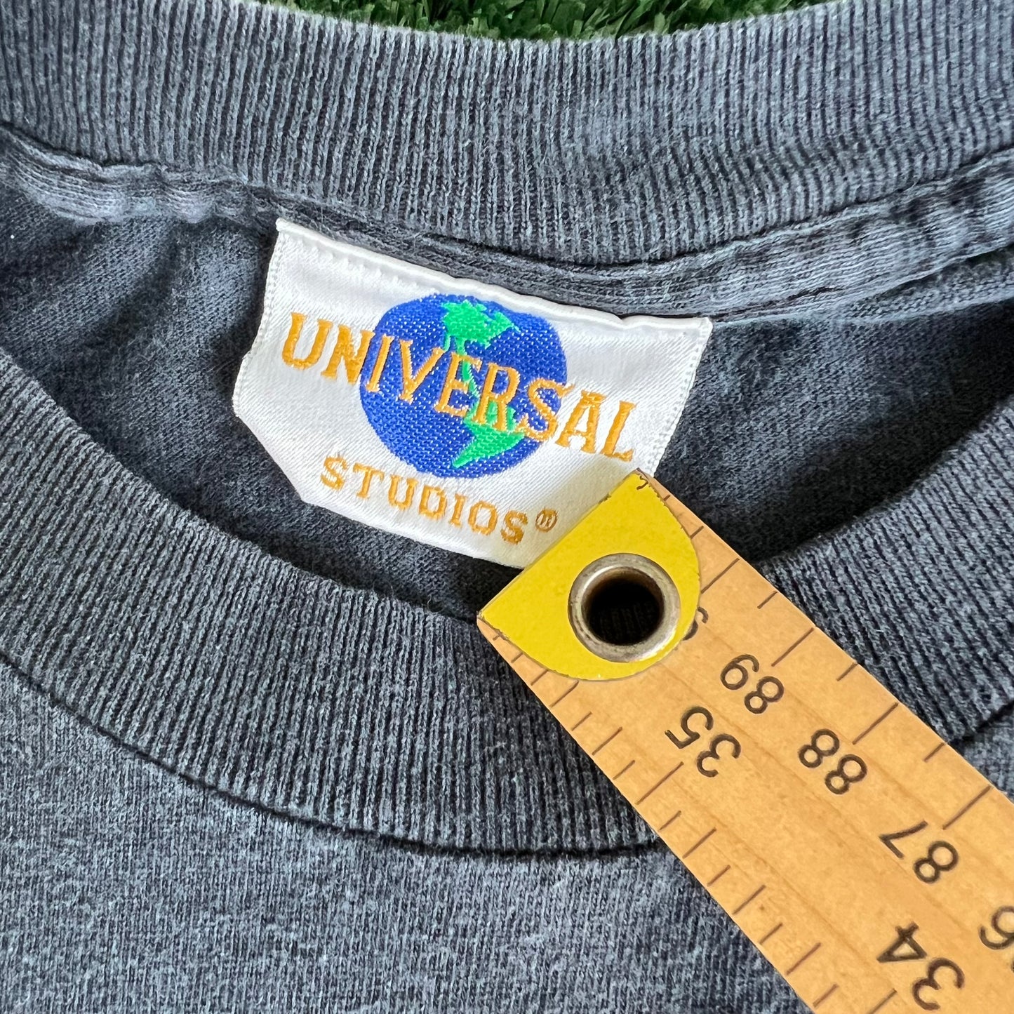 90s Universal Studios Embroidered Spellout Camera Faded Black T-Shirt - XL