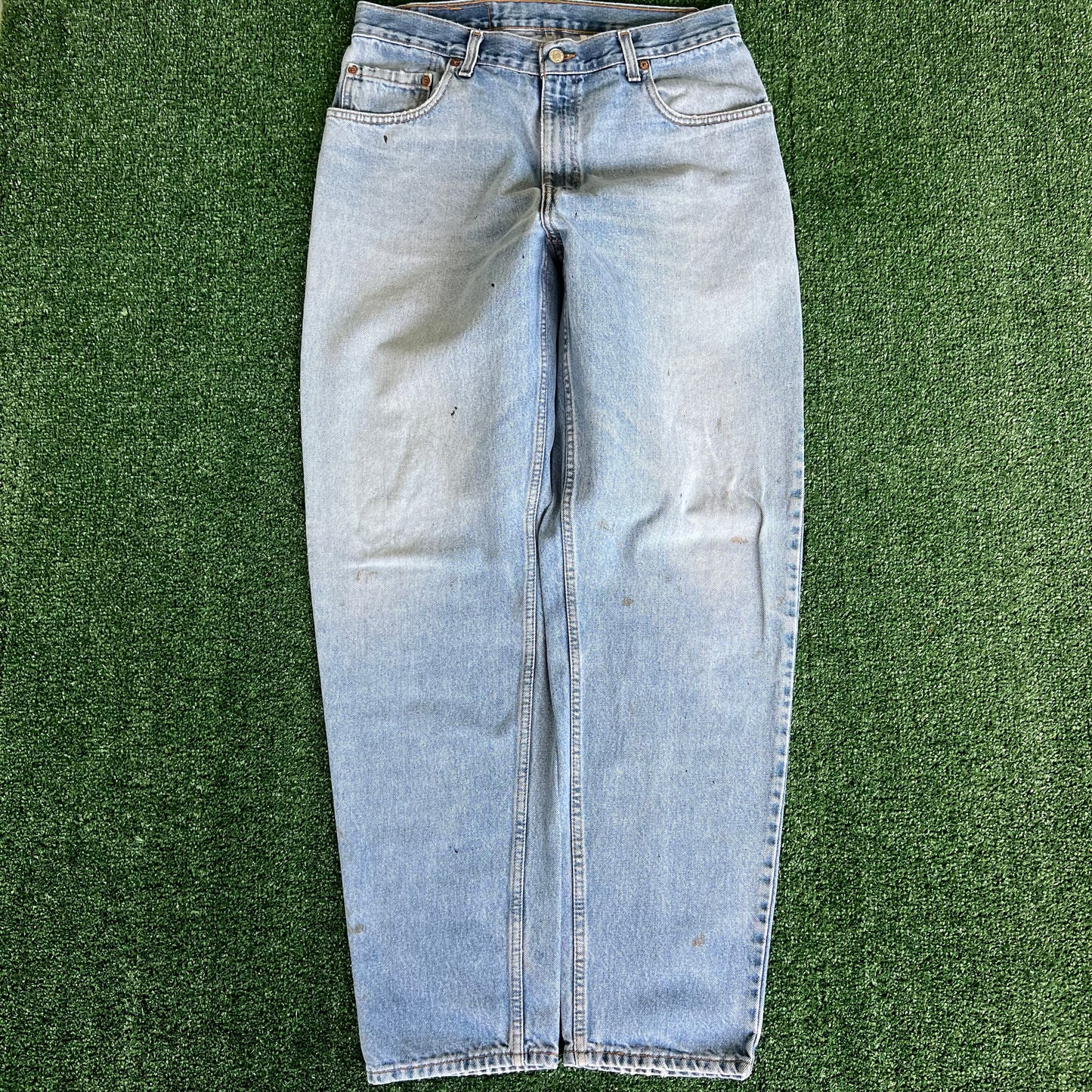 90s Levi's 560 Baggy Tapered Distressed Light Wash Blue Jeans - 34x33.5"