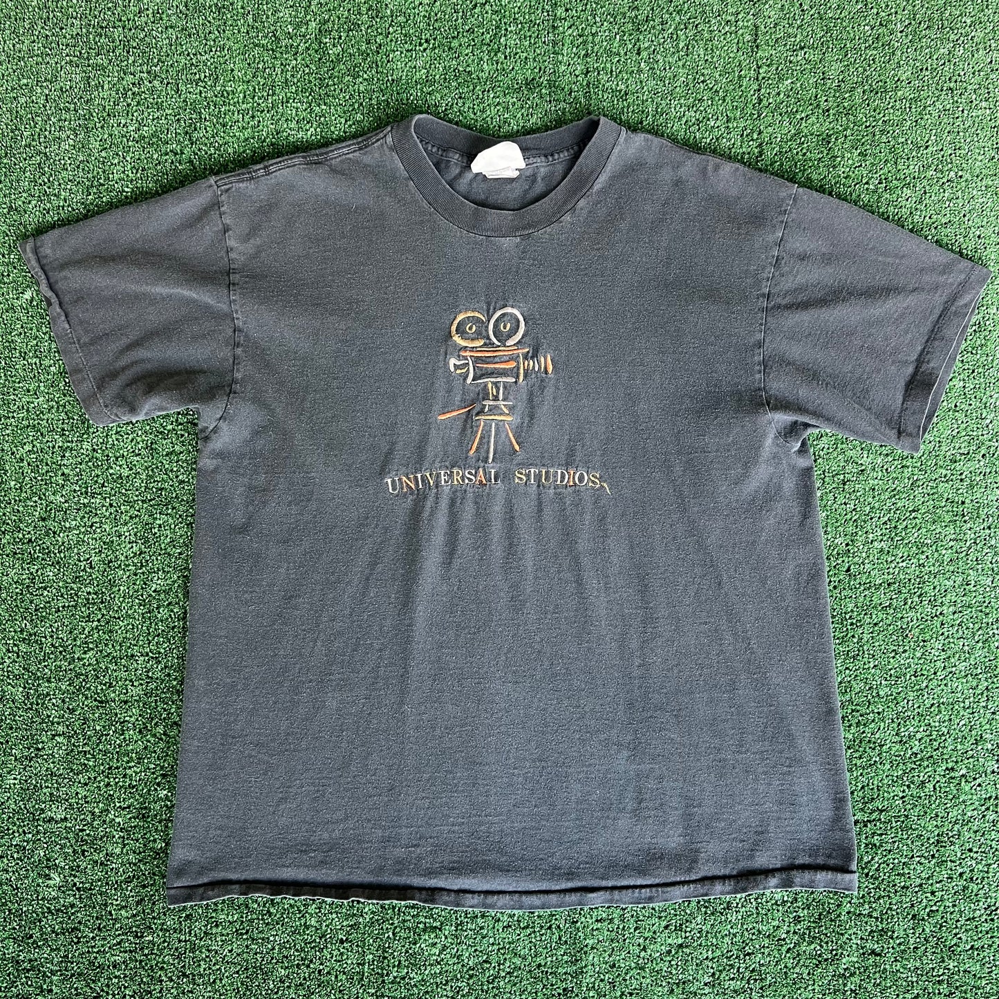90s Universal Studios Embroidered Spellout Camera Faded Black T-Shirt - XL