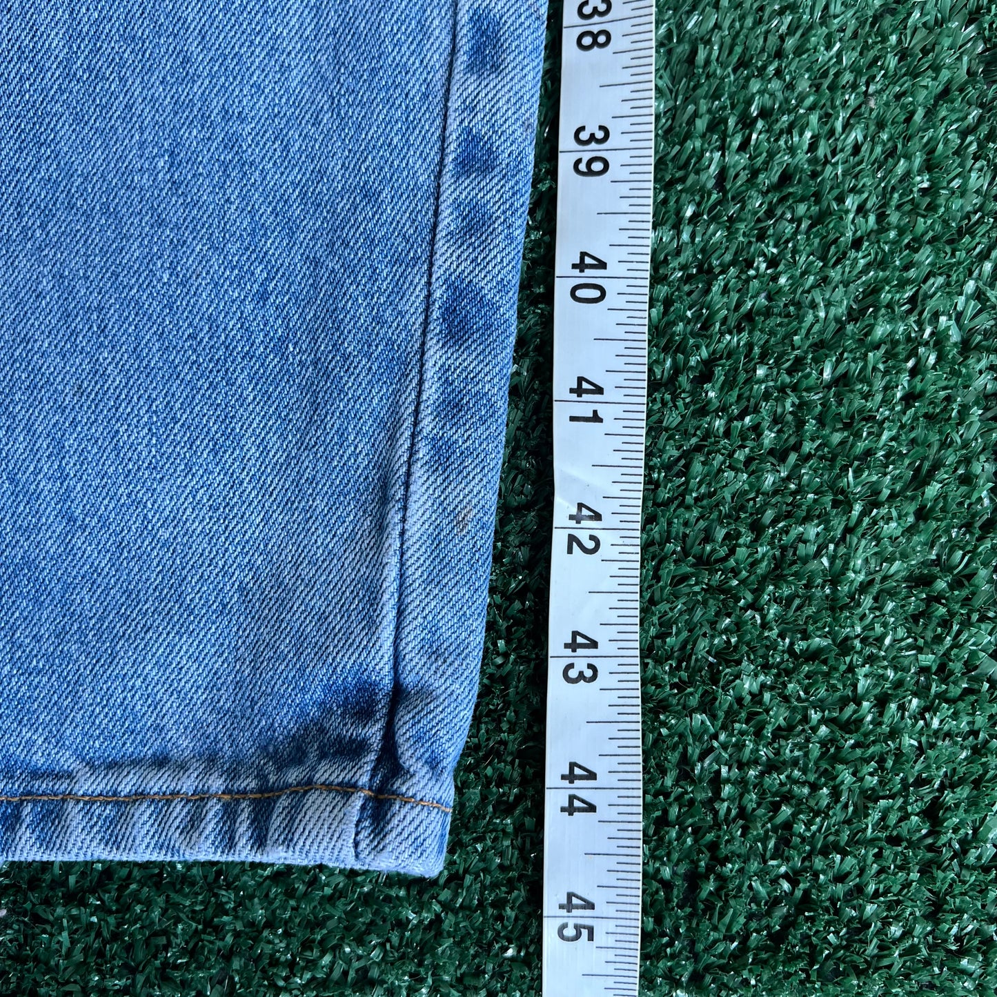 90s Levi's 560 Baggy Tapered Distressed Light Wash Blue Jeans - 34x33.5"