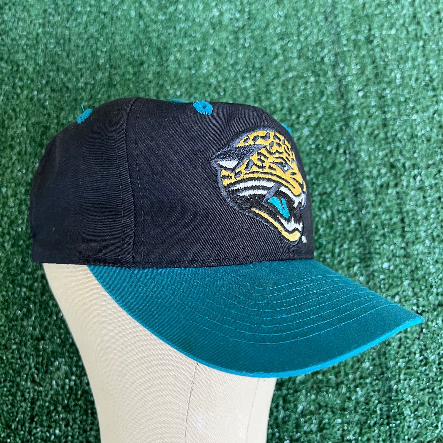 90s Logo 7 NFL Jacksonville Jaguars Black Snapback Hat