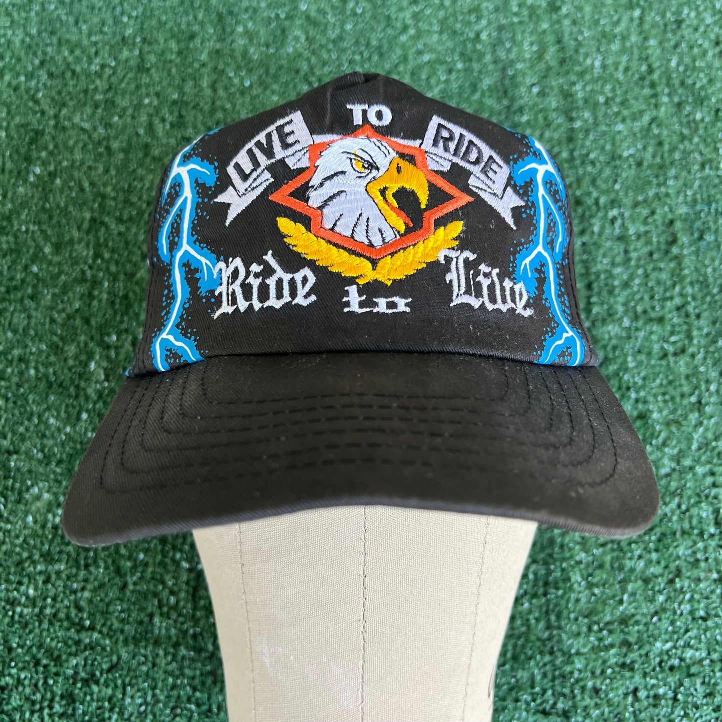 90s "Live to Ride Ride To Live" Bald Eagle AOP Faded Black Lightning Snapback Hat