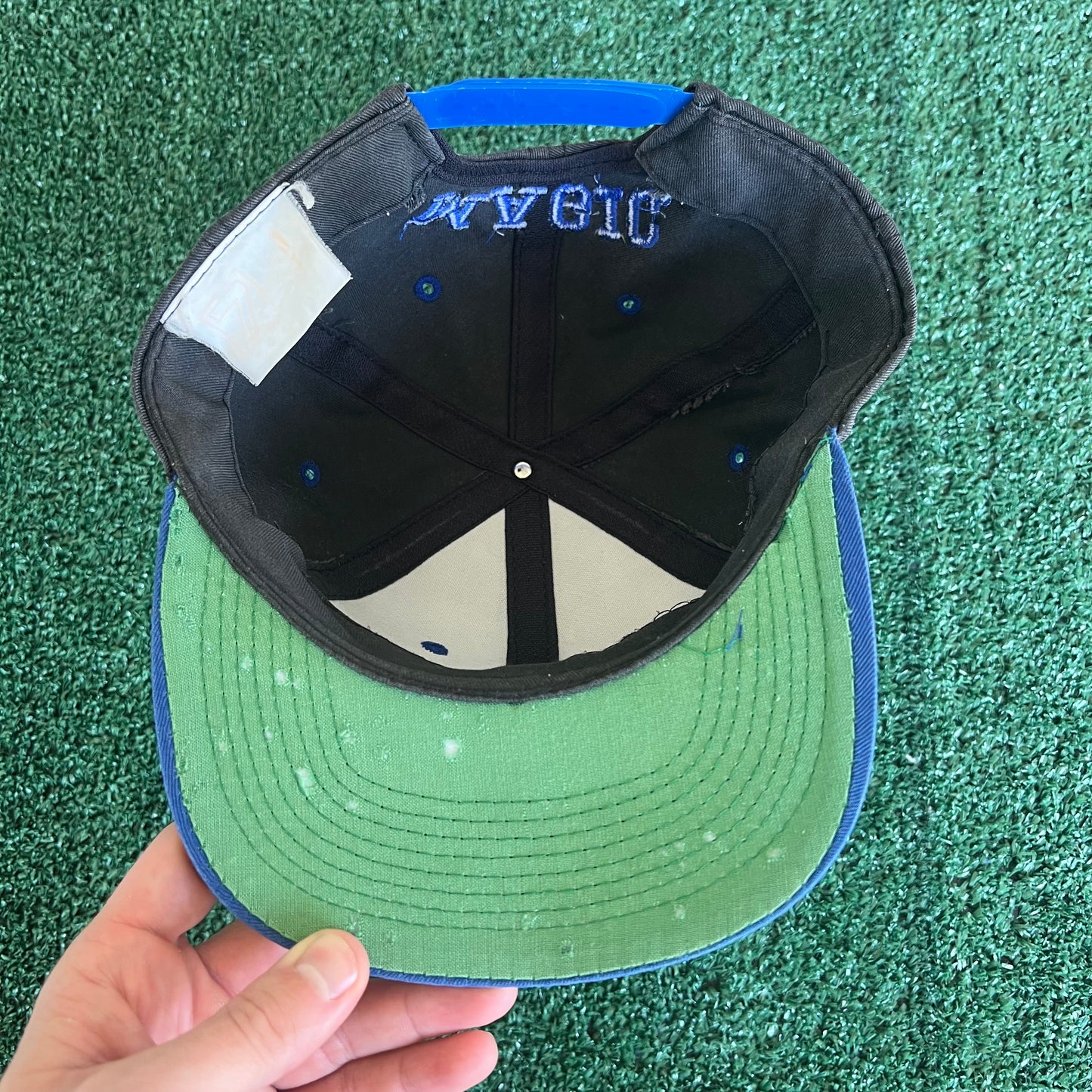 90s Logo 7 NBA Orlando Magic Script Spellout Faded Black Snapback Hat