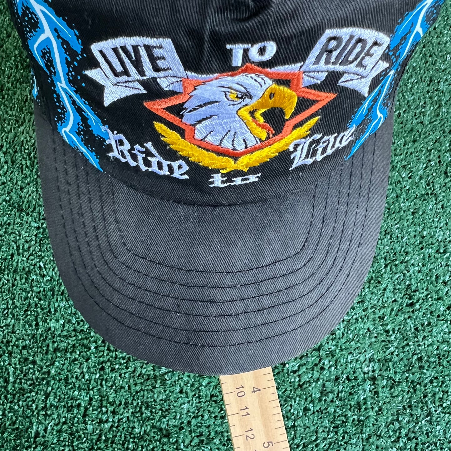 90s "Live to Ride Ride To Live" Bald Eagle AOP Faded Black Lightning Snapback Hat